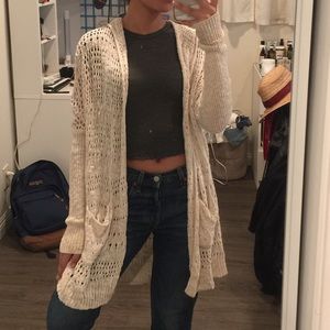 Knit beige cardigan with a hood